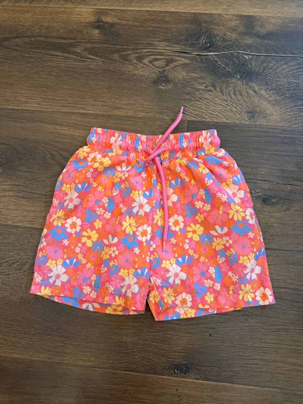 Pink Lily x Krista Horton floral boy swim trunks